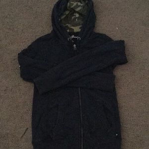 Navy blue zip up jacket with camp hood